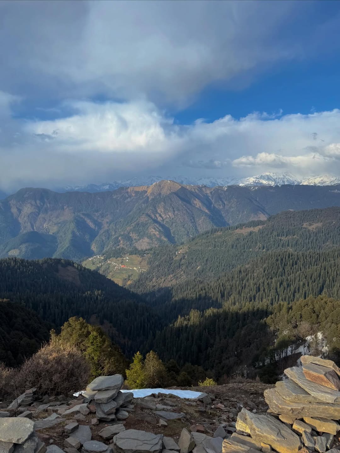 Sweeping views across layered ridges from a high pass